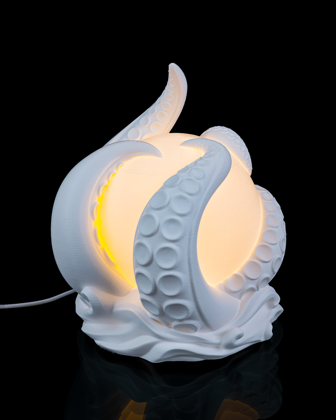 Ceramic lamp with a textured design on a black background