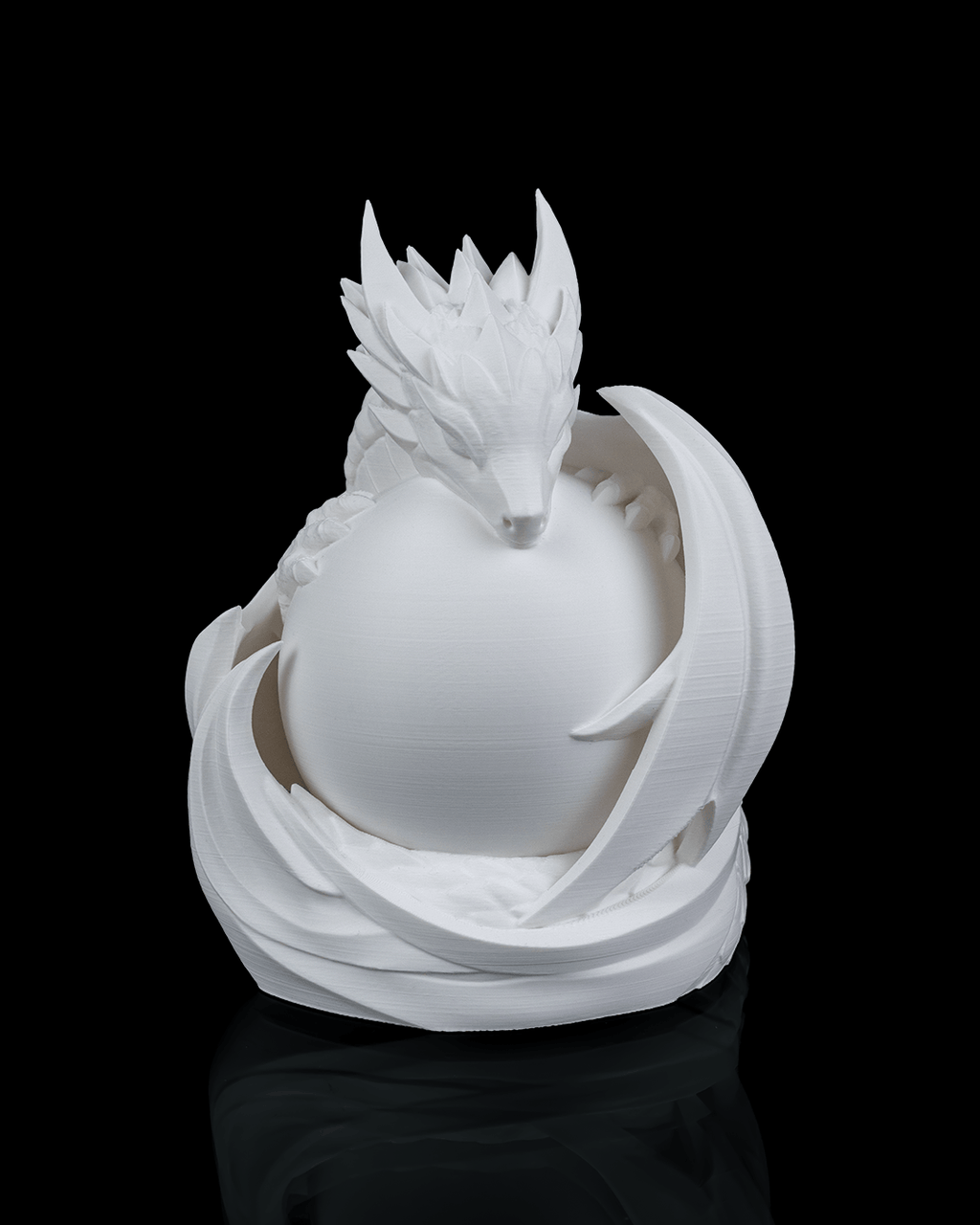 White dragon sculpture on a black background