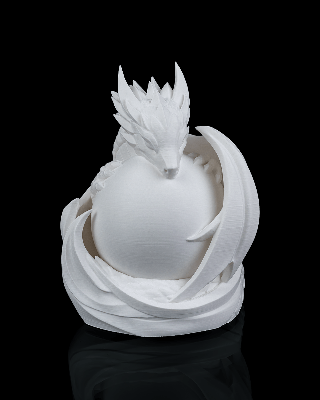 White dragon sculpture on a black background