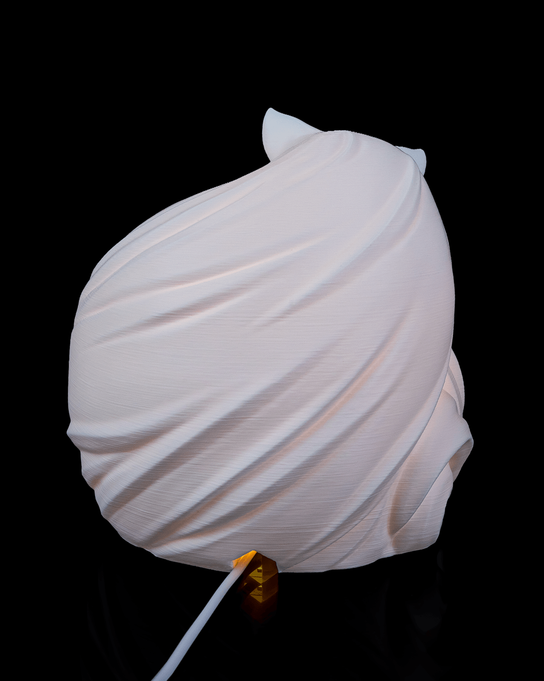 White lampshade with a black background