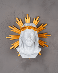 Decorative wall piece with a bust of a bearded figure and gold sunburst on a gray background