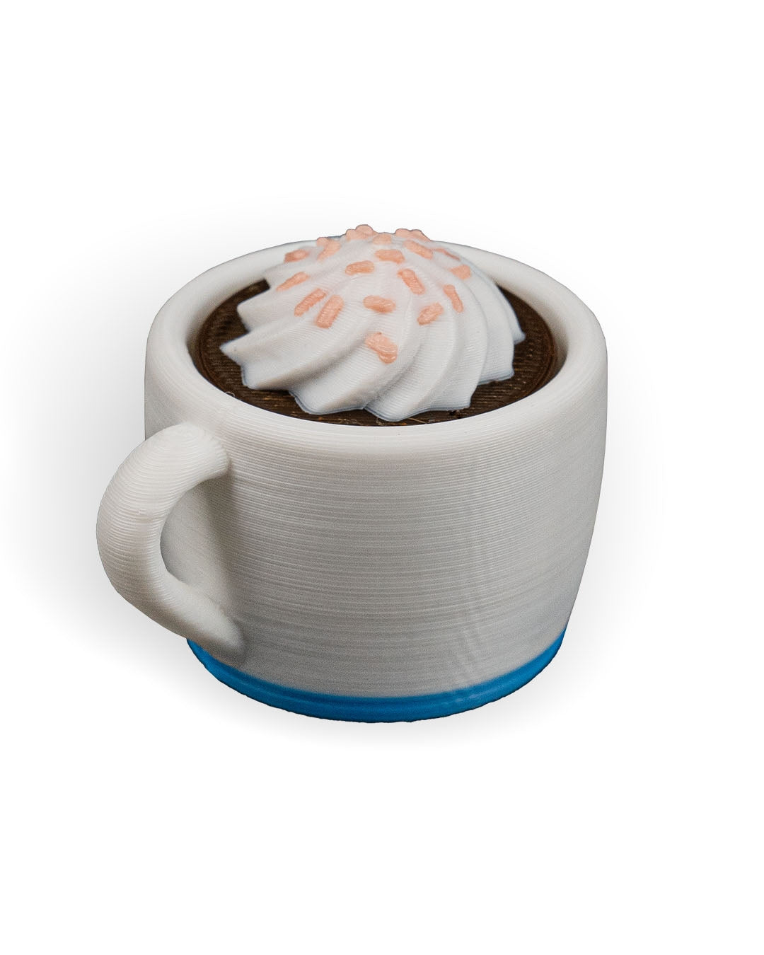 Ceramic mug with a chocolate drink and whipped cream on a white background