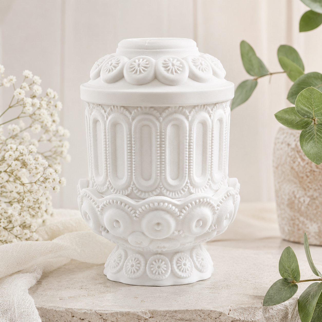 White ornate fairy lamp displayed on a neutral shelf with soft natural decor and handmade home accent styling.