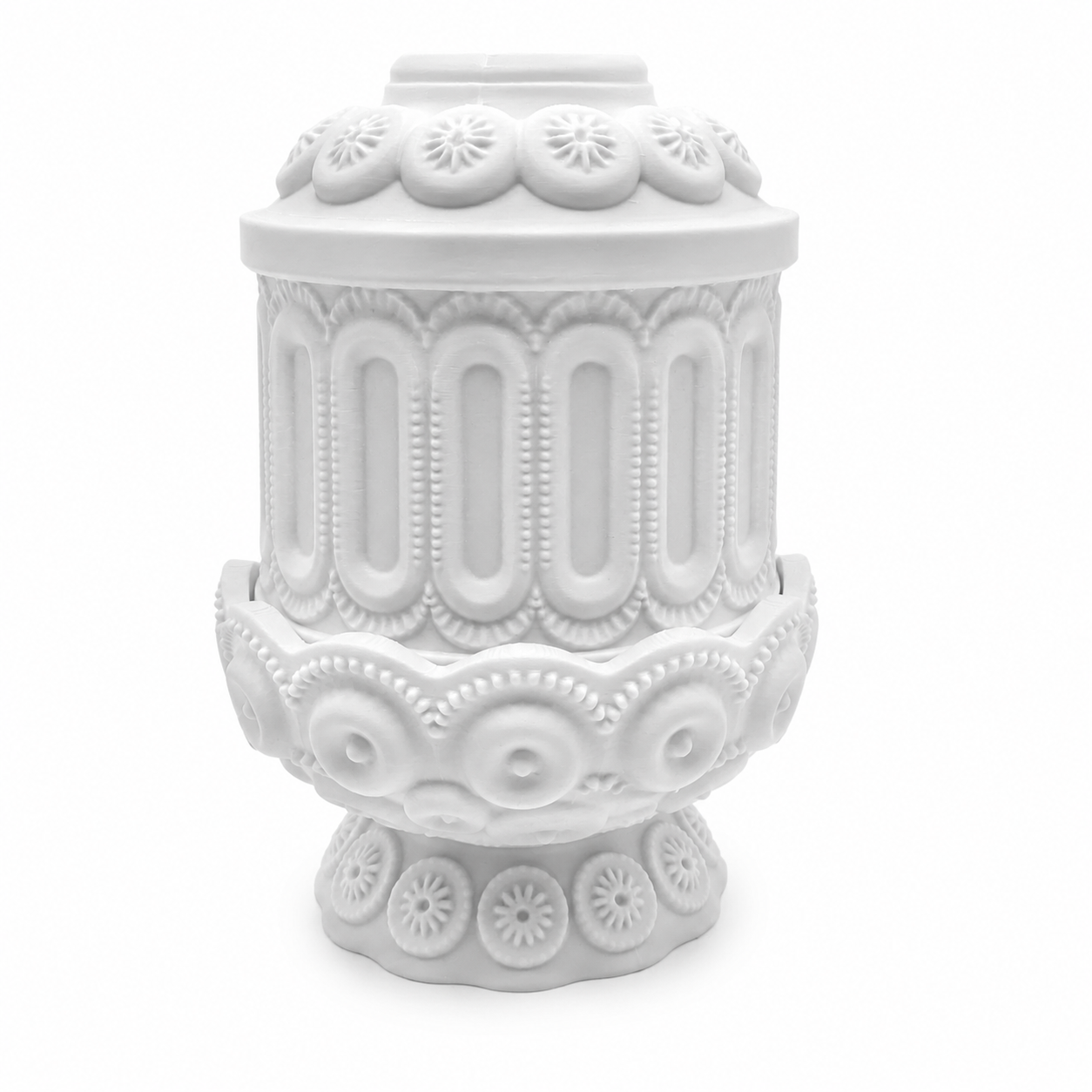 Side view of a white decorative fairy lamp showing raised oval panels, beaded texture, and ornate molded details.