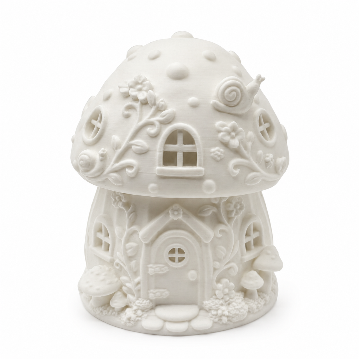 Front view of a white mushroom fairy house LED tea light holder with fairy door, arched windows, floral vines, tiny mushrooms, and raised woodland details.