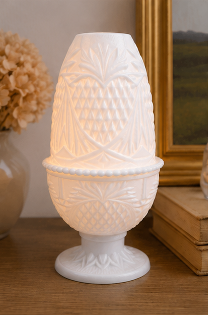 Vintage Pineapple Heart Fairy Lamp illuminated with an LED tealight in a cozy home setting.