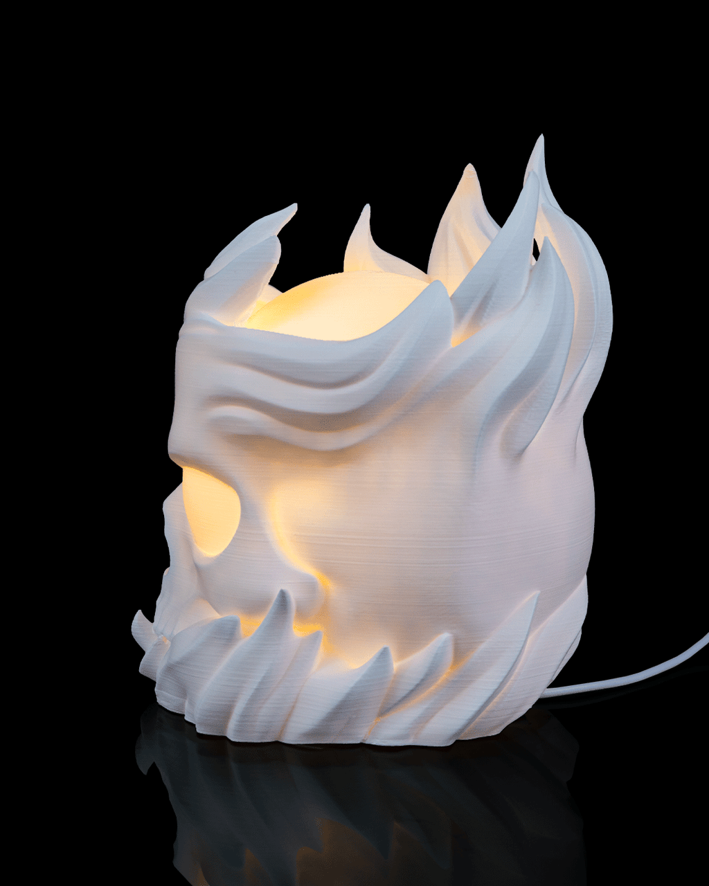 White dragon head-shaped lamp on a black background