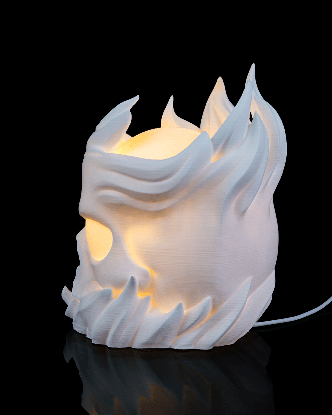 White dragon head-shaped lamp on a black background