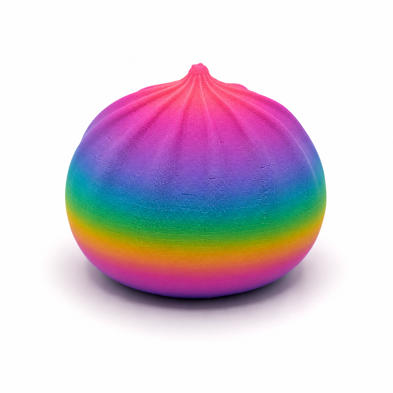 Back view of rainbow dumpling squishy highlighting folds and shape