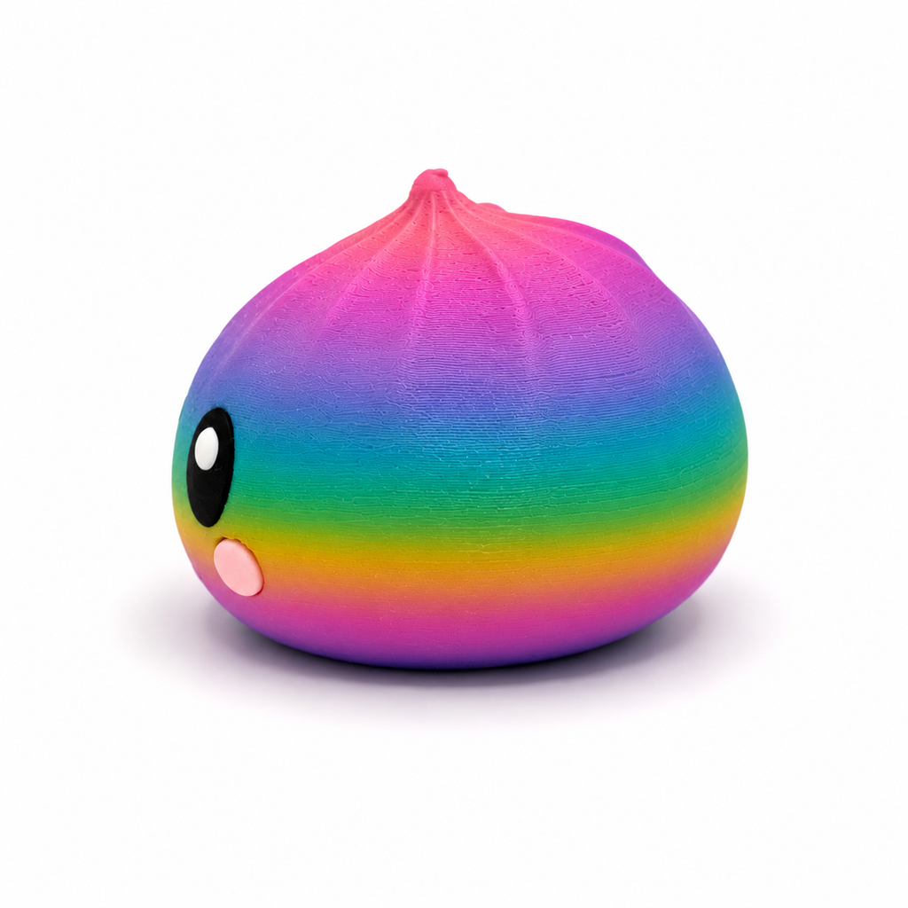 Side profile of rainbow dumpling squishy showing colorful gradient finish