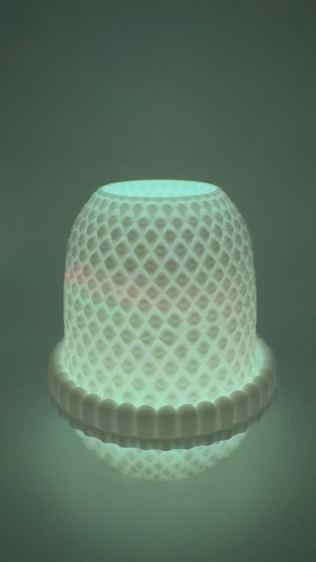 White hobnail LED tea light holder showing color changing tea light
