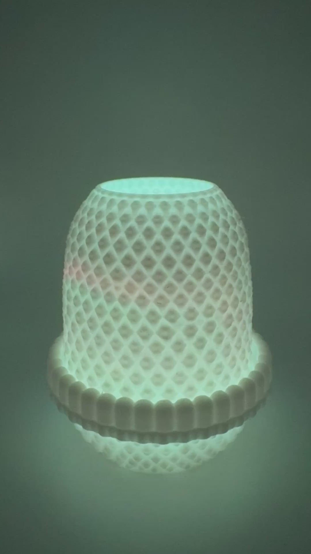 White hobnail LED tea light holder showing color changing tea light